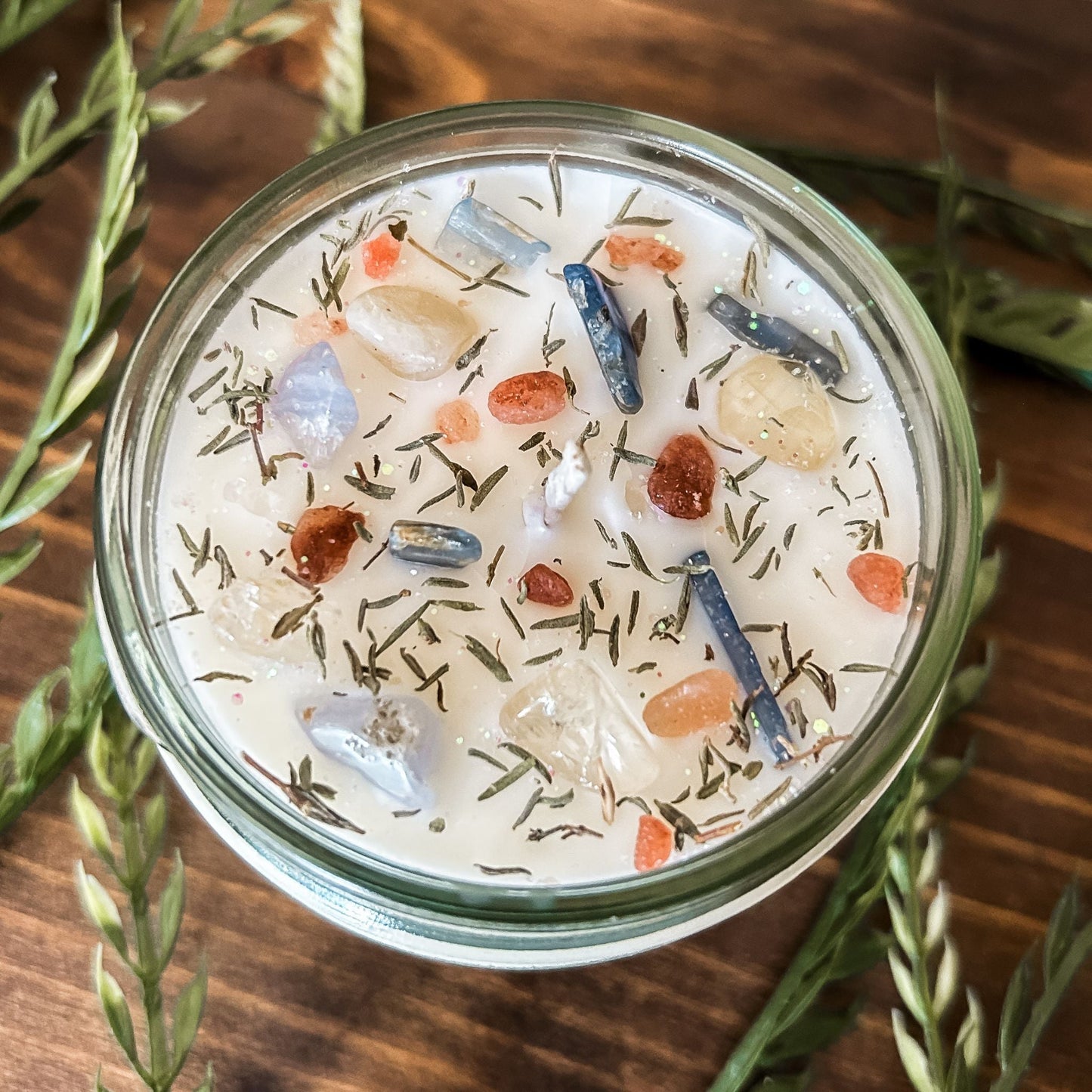 White intention crystal candle with kyanite crystal, citrine crystal and herbs for manifesting protection and cleansing energy.