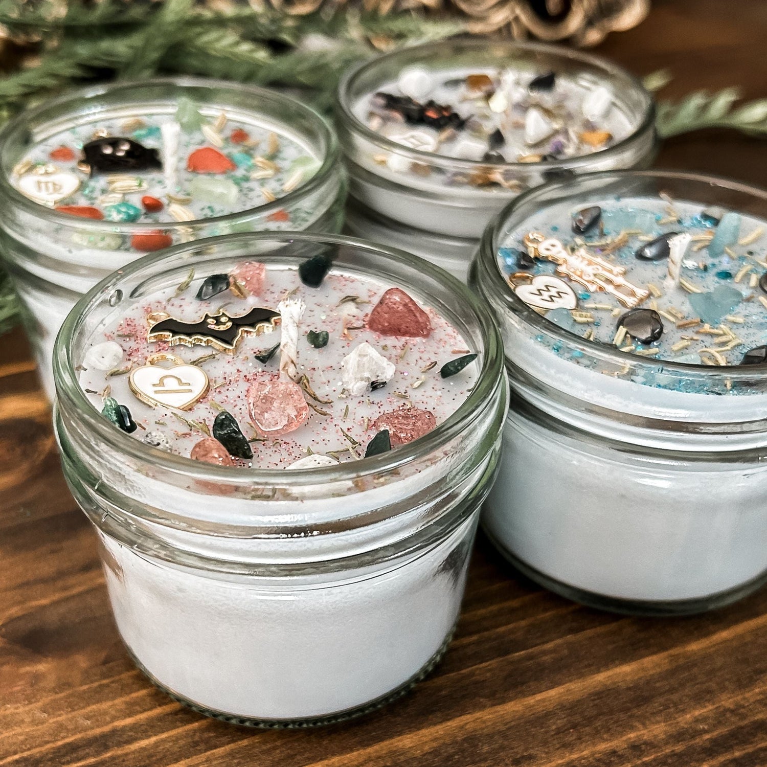 Halloween Libra Zodiac Candles with crystals, herbs, glitter, and a spooky design.